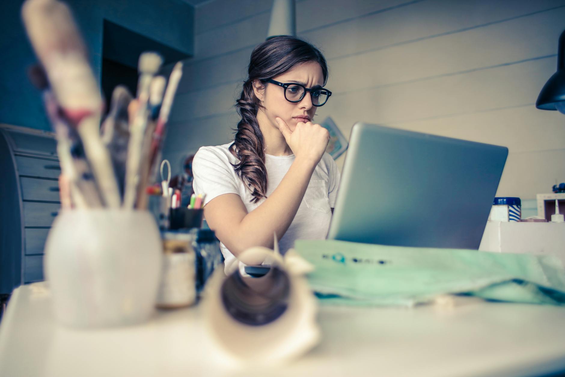 photo of a woman thinking about Belief Code